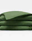 Olive green duvet cover comforter folded neatly on a white background