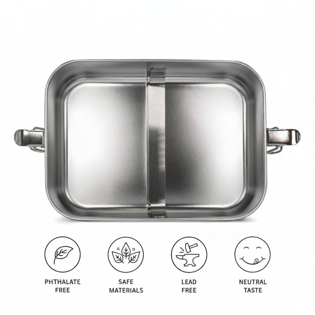 A bambaw stainless steel lunch two-compartment lunch box shown from a top-down view on a white background, with four circular icons below highlighting that it is phthalate free, BPS free, lead free, and has a neutral taste.